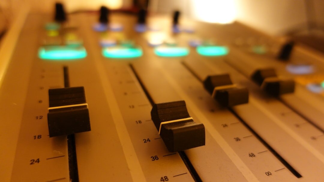 Home music recording studio with instruments and mixing desk